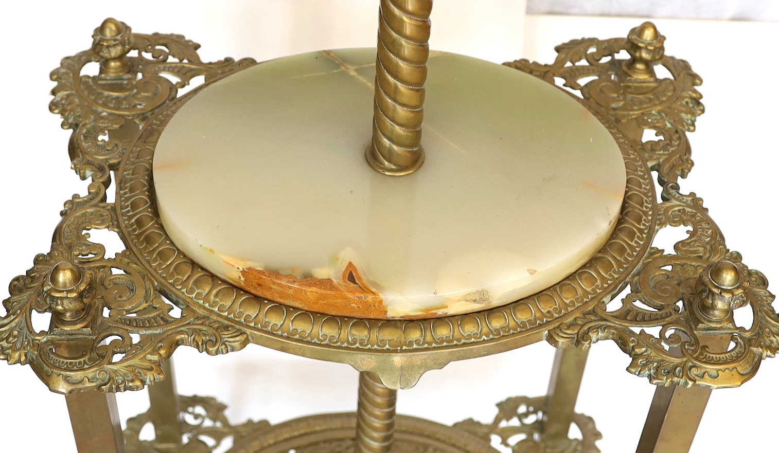 A late 19th century English pierced brass green onyx and glass lamp standard etagere, height overall 154cm, width 48cm